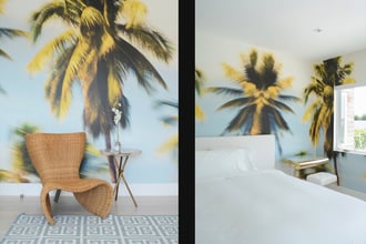 Palm Glimpse gives off easy, breezy, feel-good vibes in Sasha's bedroom.