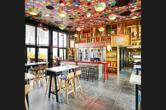 A splash of Small Flowers in Full Spectrum is always the right ingredient for adding good spirits to any interior...especially a bar. C'est magnifique CitizenM Paris!!