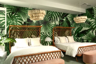 Wild Thing in Wildly Mint brings a taste of the tropics to this East Hampton, NY guest room.