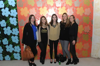 Clare and her krewe in front of Flowers