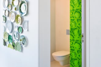Custom colored Power Plant adds whimsy, pop and panache to the half bath