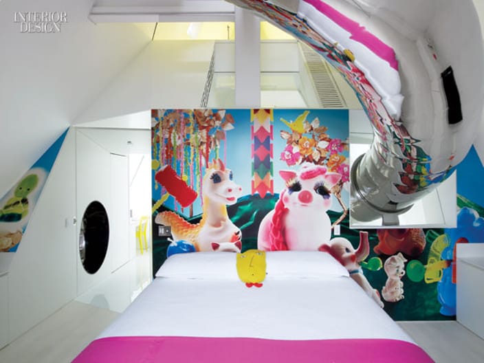 Everland makes a funky mother in law guest room where the stainless steel slide cuts through the space