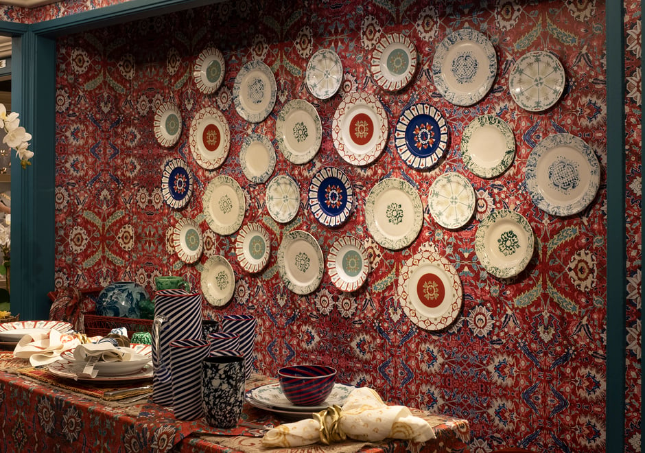 Our custom wallpaper, shown here at Bergdorf Goodman, adds extra life to the display of plates