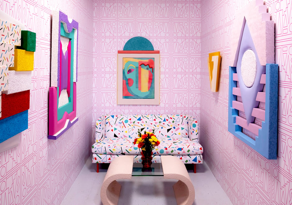 Leah Guadagnoli's lively living room is set up for visitors to interact with tactile geometric components, which play perfectly off the custom wallpaper we worked up with her. If you're interested in learning more or purchasing this design please give us a call.