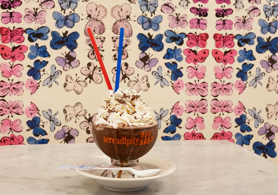 “Andy had an insatiable sweet tooth and loved all the desserts at Serendipity, especially the frozen hot chocolate,” Calderone said. Warhol also created ‘Happy Butterfly Day’ in 1955 using his blotted-line technique. It was Andy’s first foray into repetitive images, which would become one of his trademark methods. It is rumored that the watercolors might have been added at one of Warhol’s coloring parties at the Serendipity 3, which might explain the variance that makes the piece so interesting. P.S. Photo cred for all go to Boone Speed