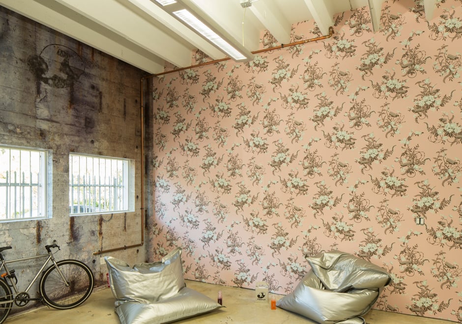 Vigilant Floral juxtaposed with Brooklyn Bridge Wall and barred windows