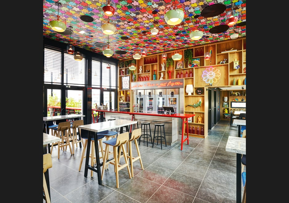 A splash of Small Flowers in Full Spectrum is always the right ingredient for adding good spirits to any interior...especially a bar. C'est magnifique CitizenM Paris!!
