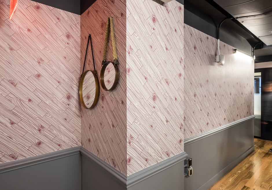 Knot Wood lends a funky homestead feel to this hallway