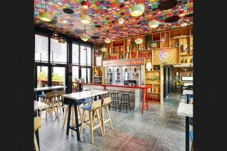 A splash of Small Flowers in Full Spectrum is always the right ingredient for adding good spirits to any interior...especially a bar. C'est magnifique CitizenM Paris!!