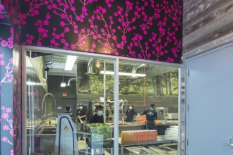 The warehouse entry featuring Sakura in Pink Pop gives a glimpse into the production space and custom digital wallpaper