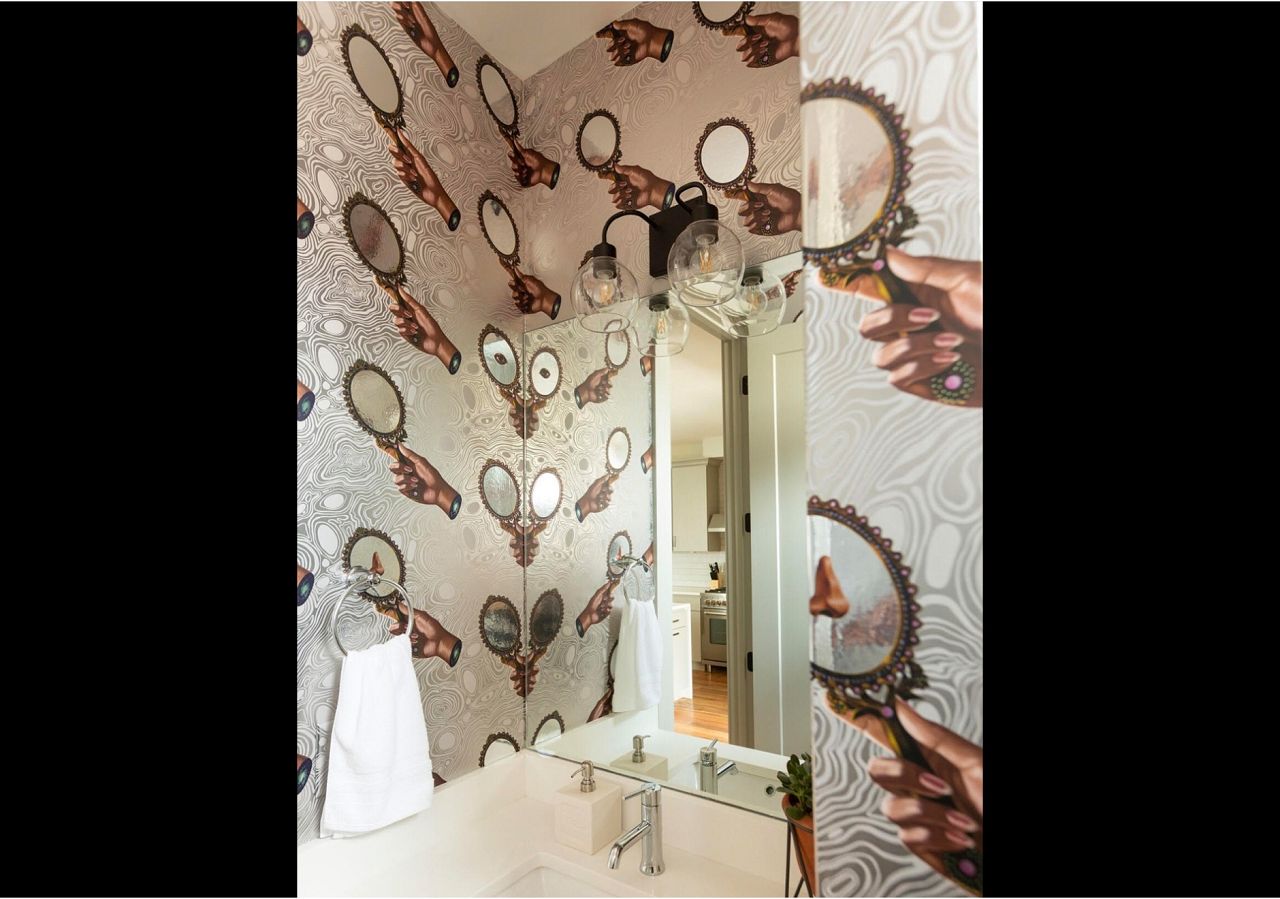 Mirror, mirror on the wall...who's one of the prettiest papers of them all? Sorry, had to, but the answer is clearly About Face, which makes a splash in this JL Design Nashville powder room. Photography by: Leslee Mitchell Photography   