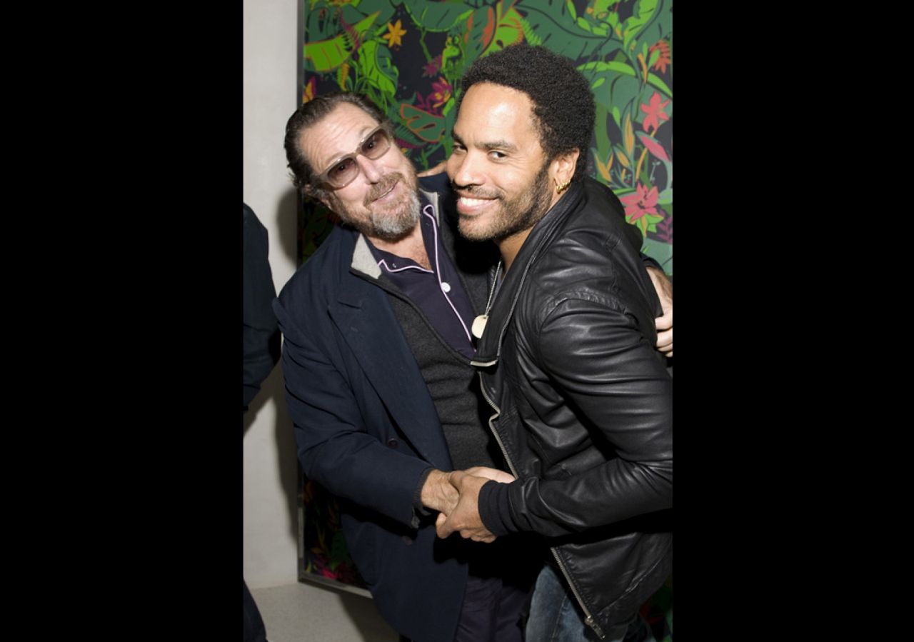 Julian Schnabel & Lenny Kravitz clown around in front of Feroz at the Flavor Paper Flavorismo party